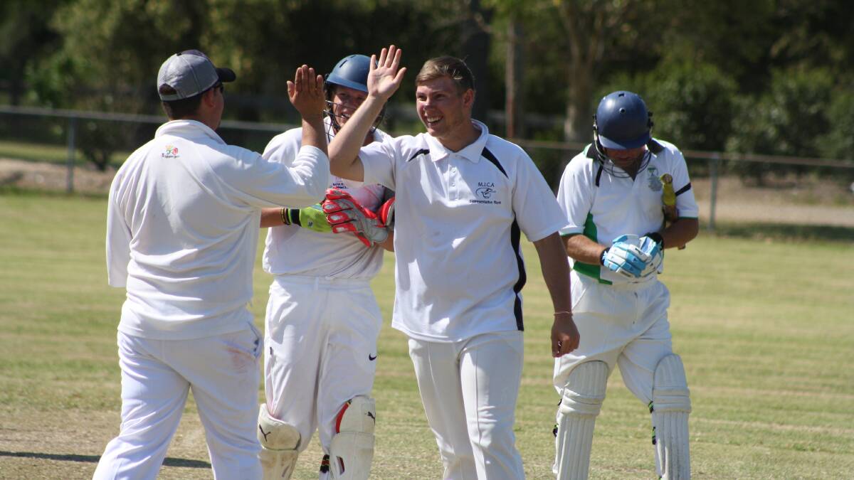 Kenneth Wamsley, Stephen Coombes and Nick Clarke celebrate the dismissal of Dennis Wamsley in Rawdon Vale’s match against Nowendoc.