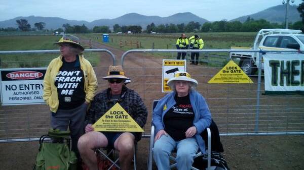 Brett Jacobs, centre, with fellow protesters at  a property on Fairbairns Lane where AGL plans to frack for coal seam gas. Pic courtesy of Lock the Gate.
