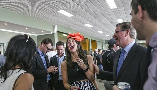 Punters' pal: Premier Denis Napthine charms the ladies at the Avoca Cup. Photo: Meredith O'Shea
