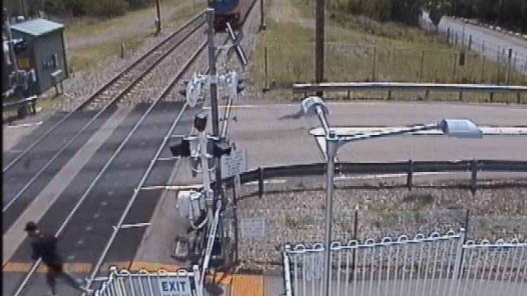 A man narrowly avoids being struck by a speeding train at Warnervale. Pic: TrainLink NSW