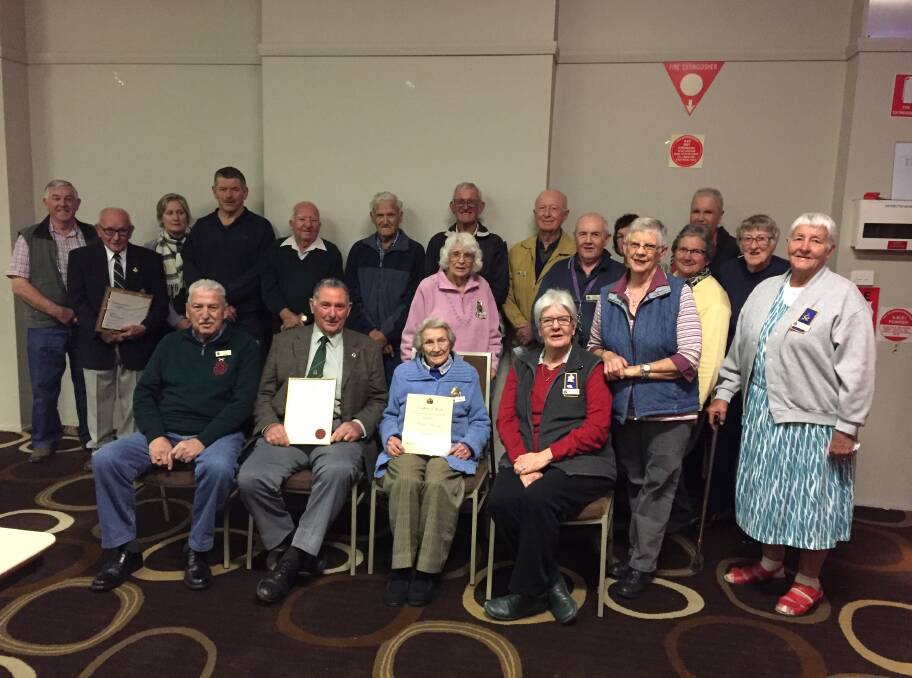 Camaraderie: Bob Murray and Beryl Murray were congratulated for their milestone service to the Gloucester RSL and Women's Auxiliary respectively. Photo: Rob Douglas.