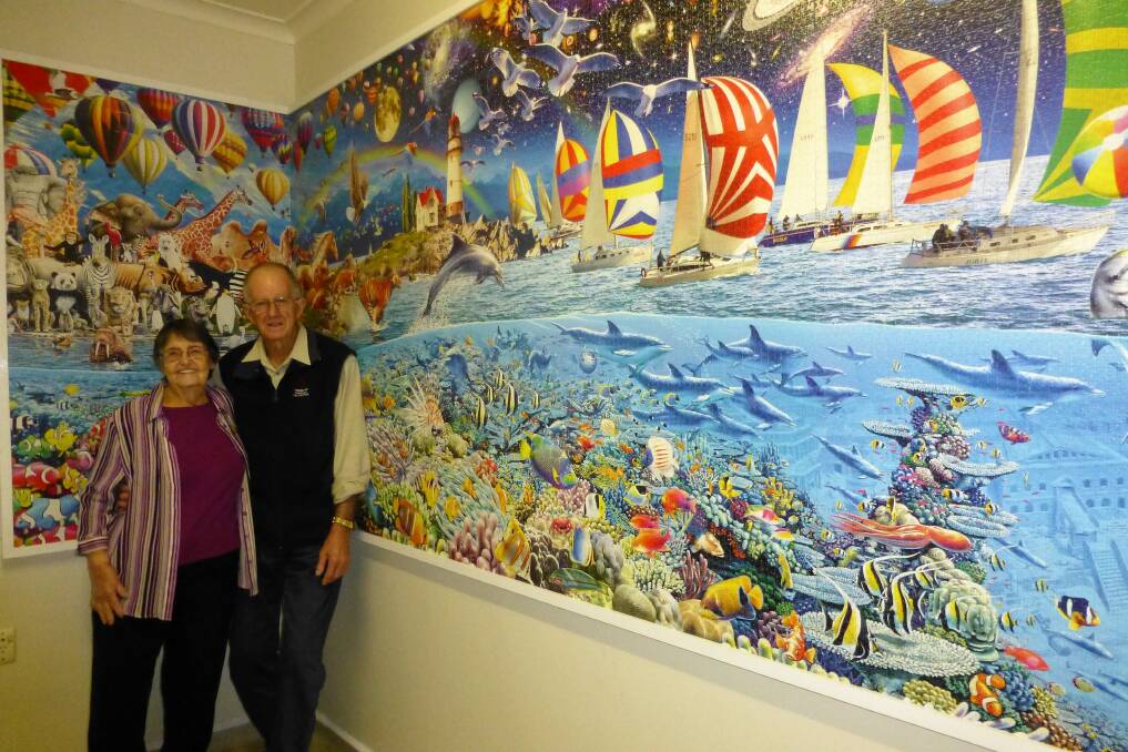 Work of art: Gloria and Alwyn Wheatley were pleased with the location of the puzzle at the Gloucester Community Health Centre. Photo: Supplied. 