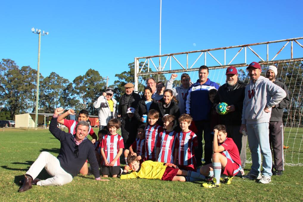 David Gillespie announces Nabiac's light funding at Saturday Soccer with the players and parents