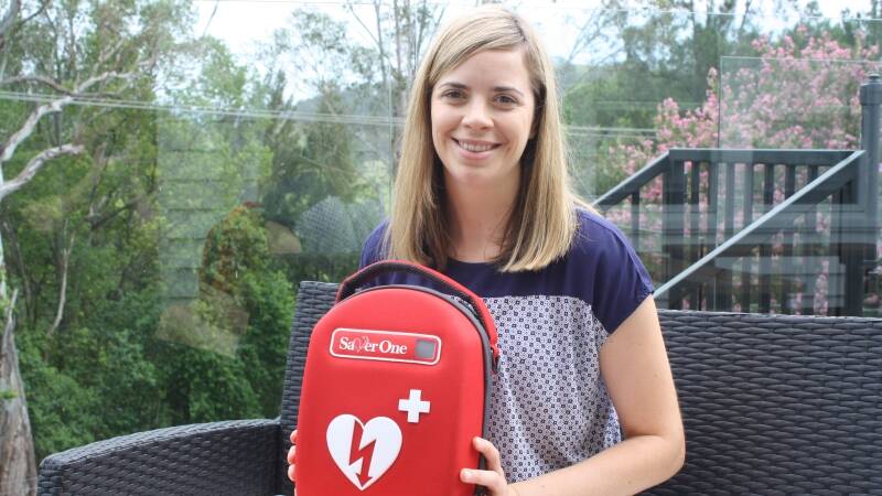 Mirabai Stockwell has travelled to Nepal to help children and young people that have been displaced by a decade of civil war and natural disasters. She is pictured with a portbale defibrillator donated by a company in Sydney.