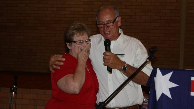 A ‘shocked and shaking’  Marie Bartlett is congratulated by mayor  John Rosenbaum after being announced as  the 2013 Gloucester Citizen of the Year.
