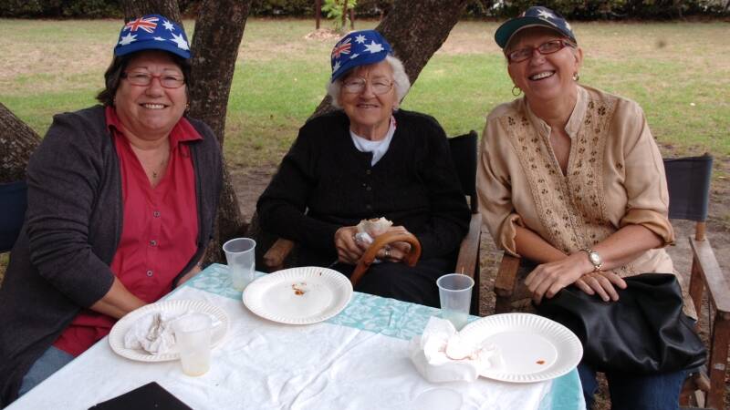 Julie Reay, Beryl Howard and Anna Freijs enjoy a traditional Aussie breakfast.