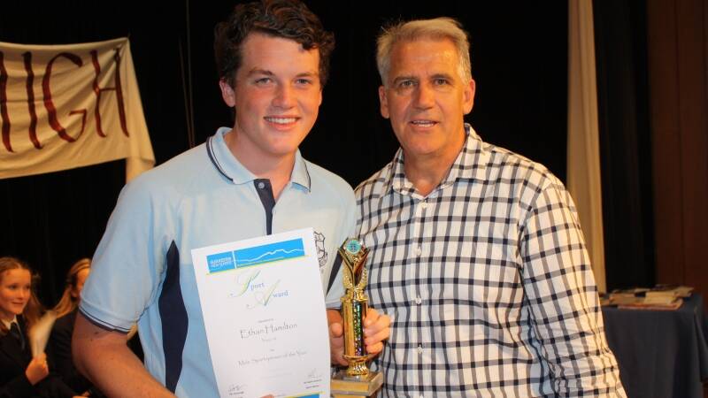 Male Sportsperson of the Year Ethan Hamilton with Ray Martin.
