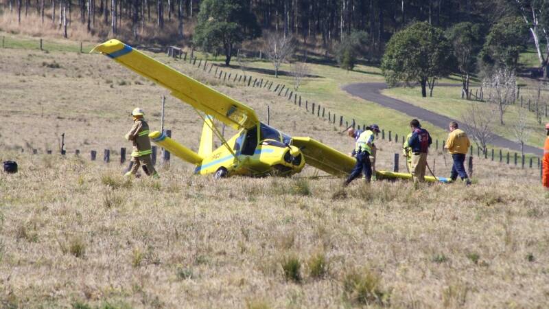 A light aircraft crashed into a paddock east of Gloucester this morning.
