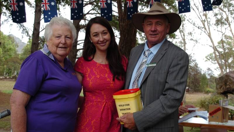Quota president Margaret Andrews and mayor John Rosenbaum present Australia Day ambassador Krystal Barter with a donation for her charity Pink Hope.