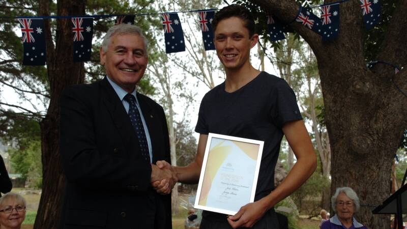 Young Citizen of the Year Jack Wilson is presented with his award by Upper Hunter MP George Souris.