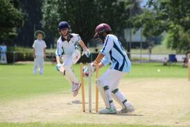 PMJCC player Luke Bowden caught short of his ground by Gloucester fill-in player Eli Tink. Picture supplied.