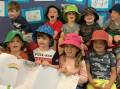 Gloucester Preschool students with happiness poster. Image: supplied