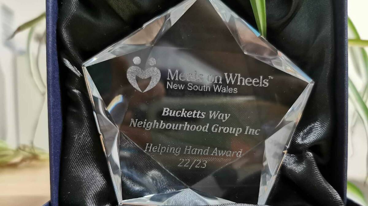 Bucketts Way Neighbourhood Group were presented the Helping Hands award from Meals on Wheels in recognition of their service. Picture supplied.