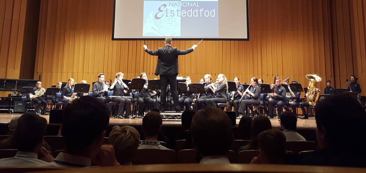 Hunter Wind Ensemble, pictured at the recent Canberra National Eisteddfod, will perform at Taree on Sunday, with a workshop and another concert in Tuncurry on Monday (see page 9 for details).