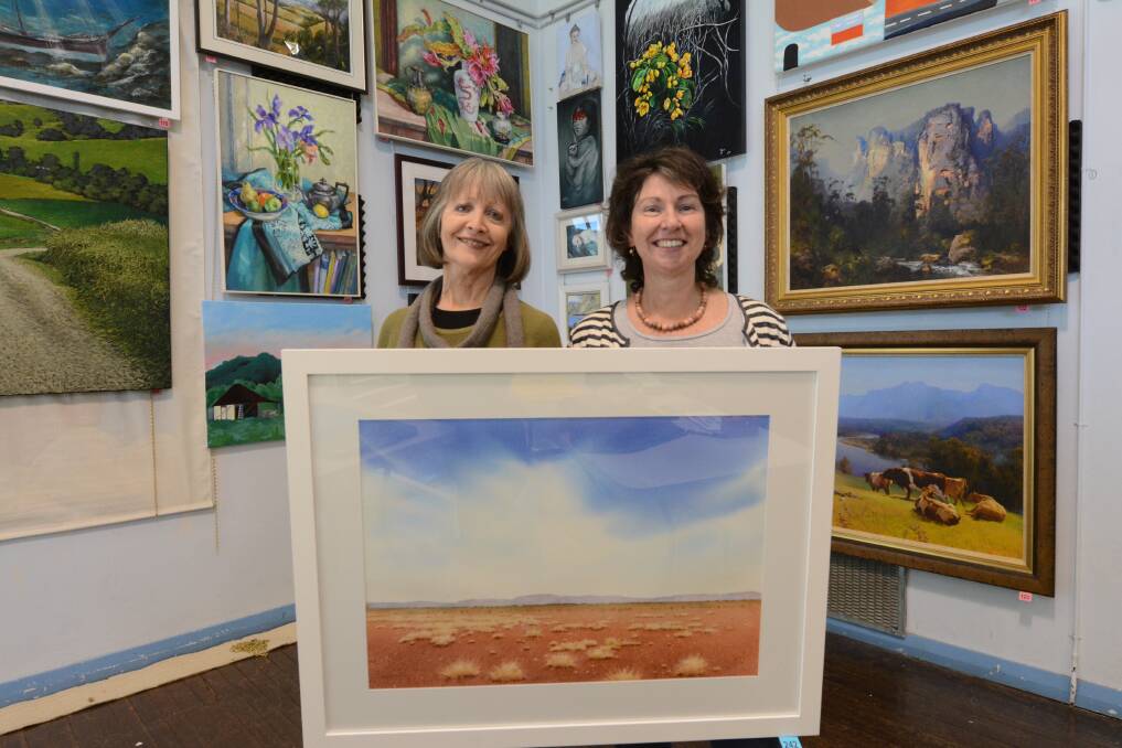 Yvette Hugill and Christine Long, pictured at the 2019 Taree Open Art Exhibition. Entries are now open for this year.