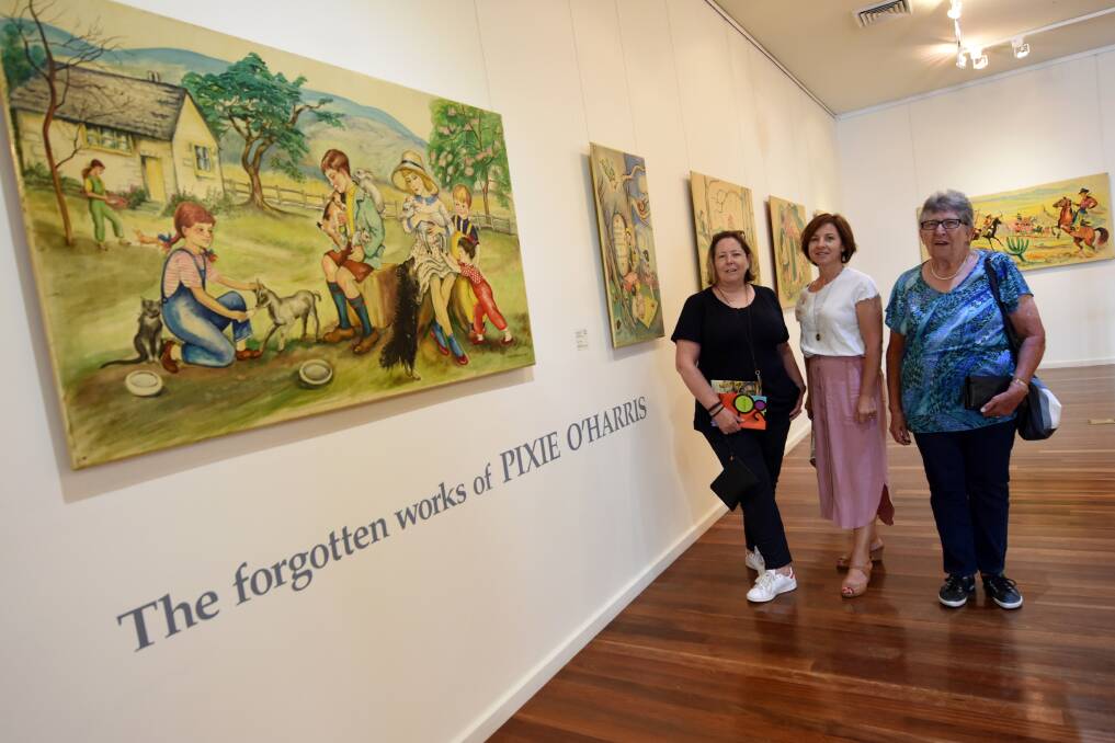 Forgotten works found: Jane Titterington, Sandra and Daphne Sumsky from Port Macquarie at the Pixie O'Harris exhibition at the Manning Regional Art Gallery.