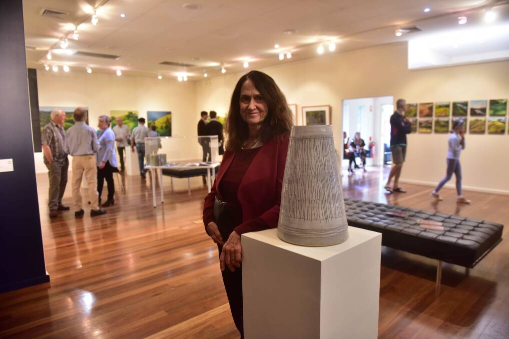 On show: Head to Manning Regional Art Gallery for exhibitions by Manning artists Yvette and Peter Hugill and Jane Hosking. Pictured is Jenny Hooper at the official opening. Photo: Julie Slavin.