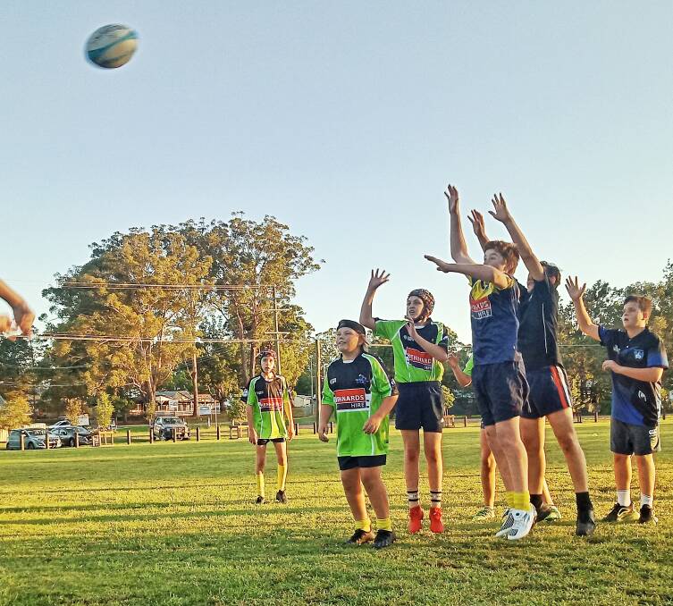 Players complete a lineout drill during last year's Get Into Rugby program conducted at Nabiac. This year's program will again be held at Nabiac, starting from Friday July 17.