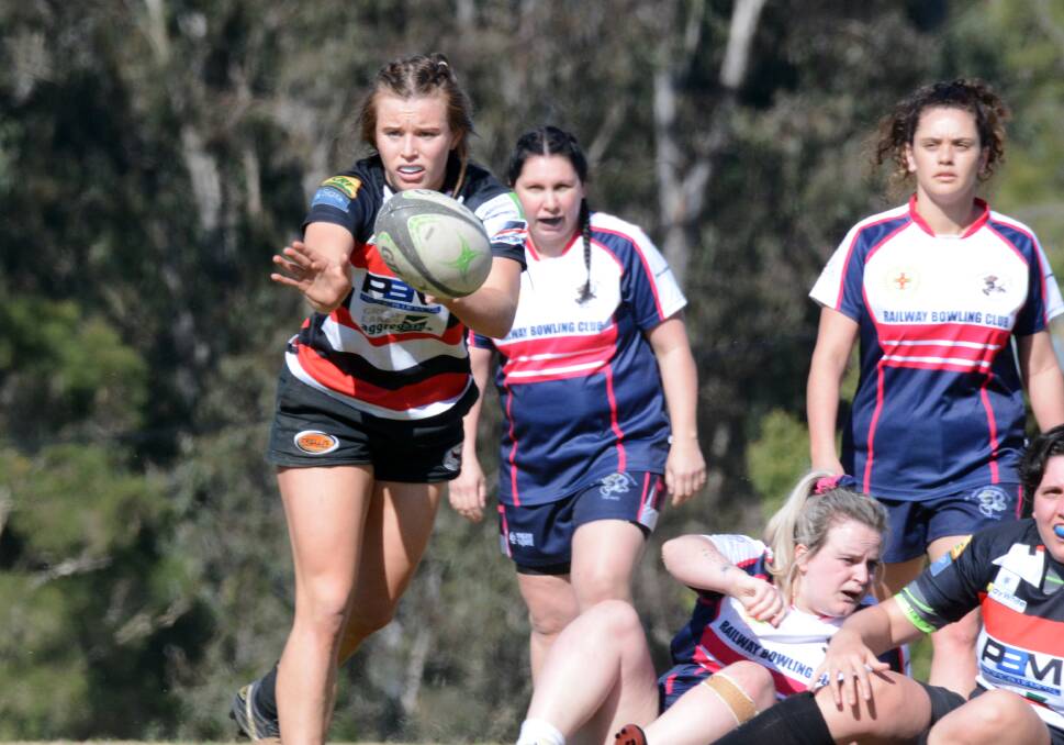 Gloucester's Charlotte Maslen fires out a pass during the 10s clash against Manning Ratz played at Taree. Photo Scott Calvin.