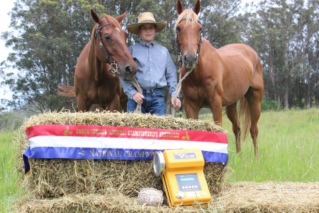 Zac Moore with his two horses and the fruits of his labour from a successful season of ranch sorting. He is the national under 12 champion.