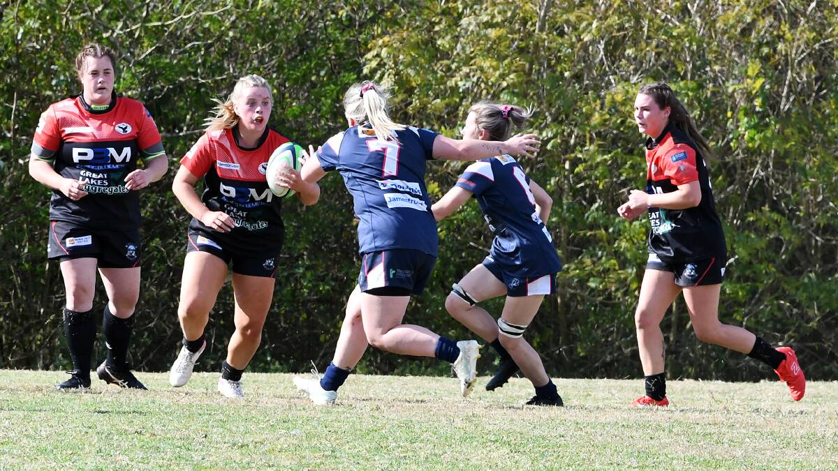 Elle Schumann makes a charge for Gloucester in last year's grand final against Manning Ratz at Taree.