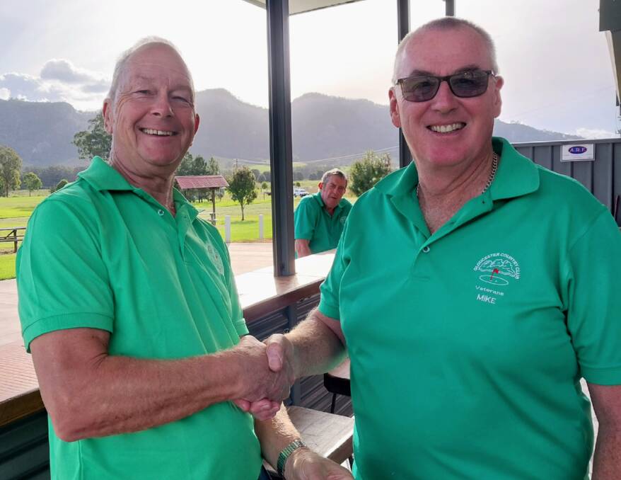 Stableford winner Peter Sate (left) with the event's sponsor Mike Howard.
