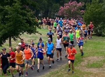 Runners make the way around the 5km course at Gloucester Park.