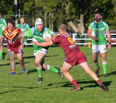 Clint Osborne takes the ball up for Stroud Raiders in the clash against Dungog Warriors at Stroud showground. Photo: Lisa Tull