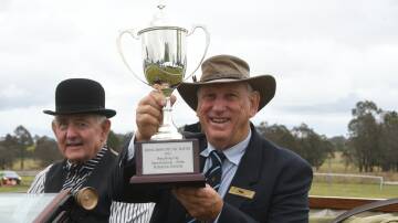 Bill Betts, Mittagong, and Bong Bong Picnic Race Club chairman Simon Parks holding the 2023 Bong Bong Cup. Picture by Virginia Harvey
