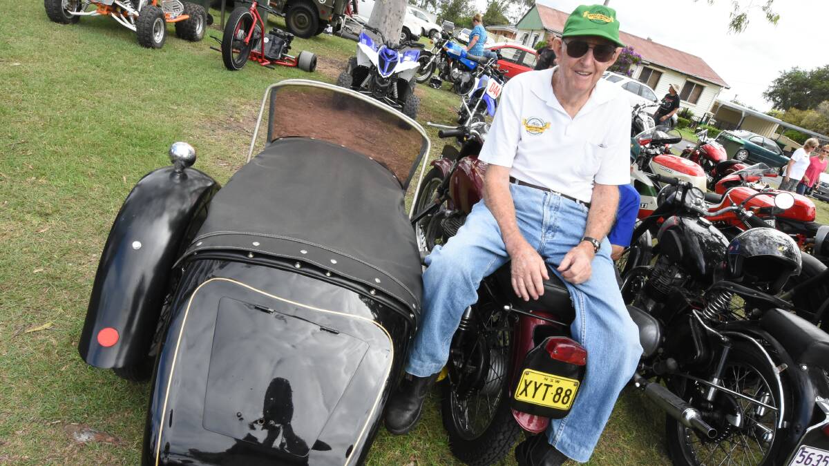 Fredrick Garland and his 56 Royal Enfield and sidecar: Frank is a founding member of the Taree and District Vintage and Classic Motorcycle Club and he is pictured taking part in a recent display held in conjunction with the Cundletown Markets.