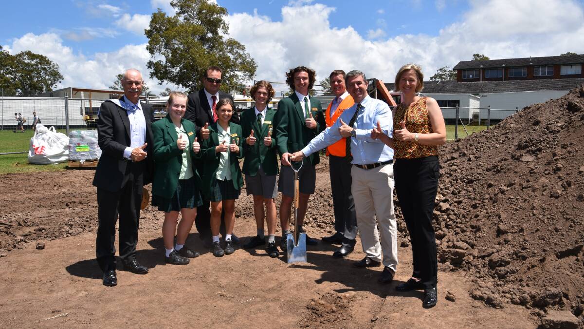 Turning the first sod: St Clare's principal Peter Nicholls, vice captain Jennifer Westley, assistant principal Phillip Gibney, captain Ruby McIntosh, vice captain Ryhs Hood, captain Macabe Grass, with fedreal MP Dr Daid Gillespie and Adrian Robertson and Melanie Costello of MCR Building.