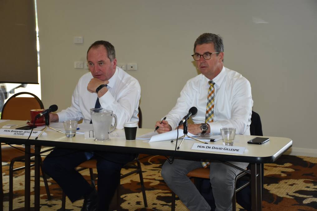 VISITING:Chairman Barnaby Joyce and David Gillespie listen to speakers in Singleton at the inquiry into the mining sector.