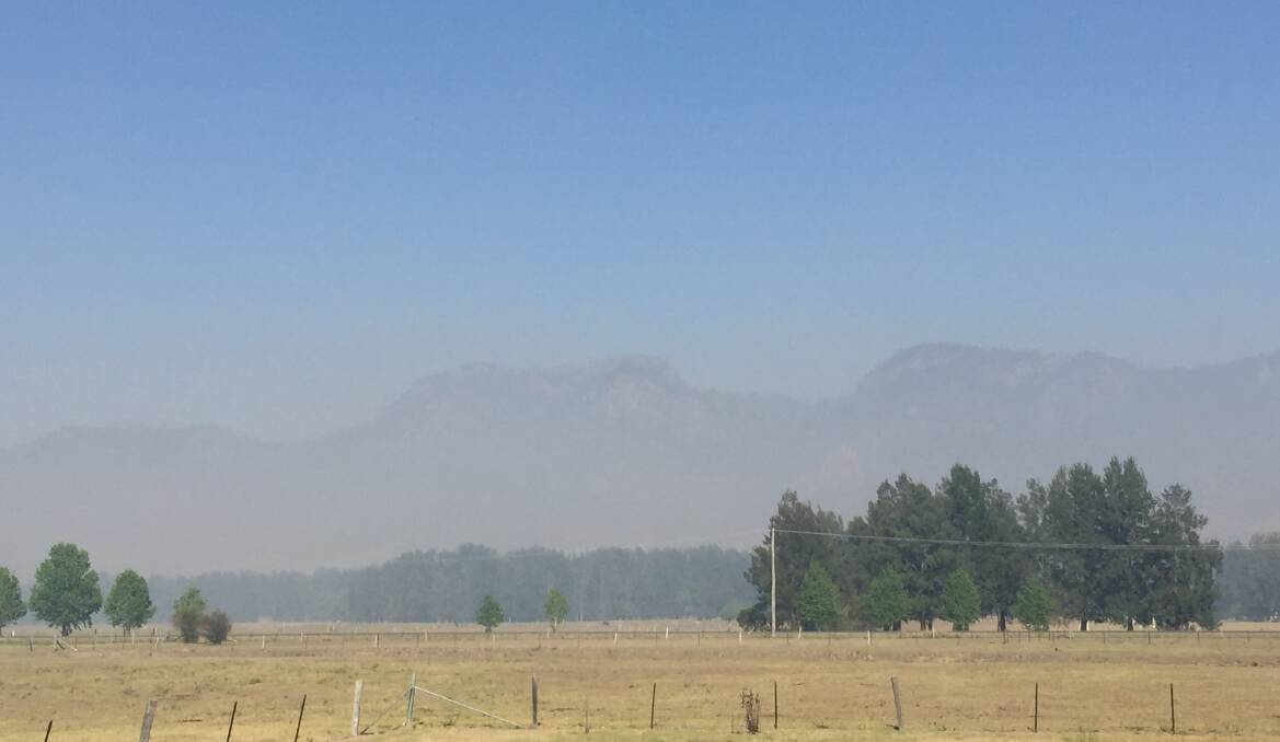 The Bucketts mountain range has been in and out of view under the heavy smoke that comes and goes from Gloucester.