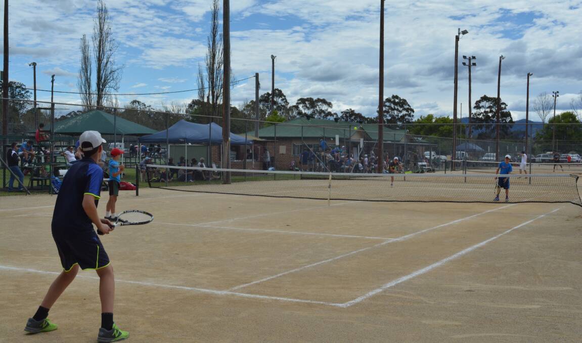 The Gloucester Open AMT and JT tennis competition draws a large group of players and spectators to Gloucester over the October long weekend.