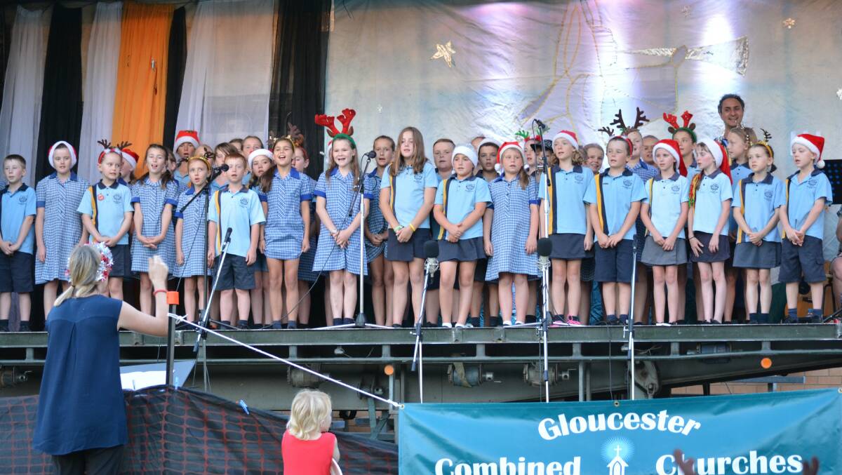 COVID may restrict the ability for large school choirs at the 2021 Carols by Candlelight like this one back in 2016. 