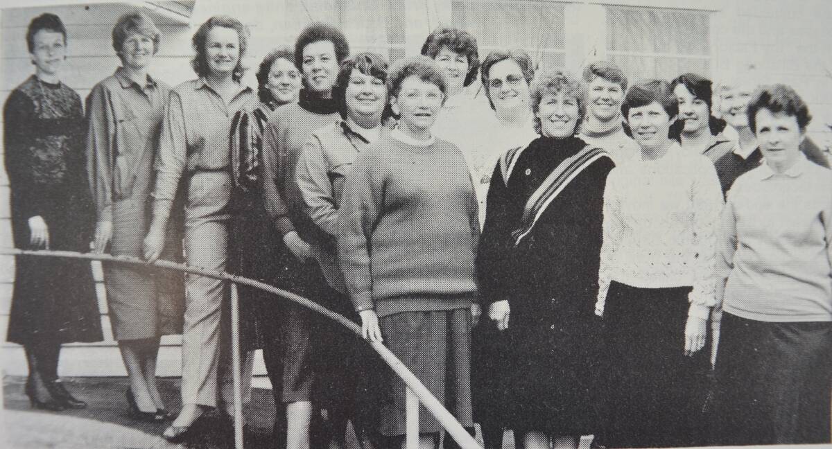 Members from both the day and evening branches who joined together for the annual International Day celebration in July 1987.
