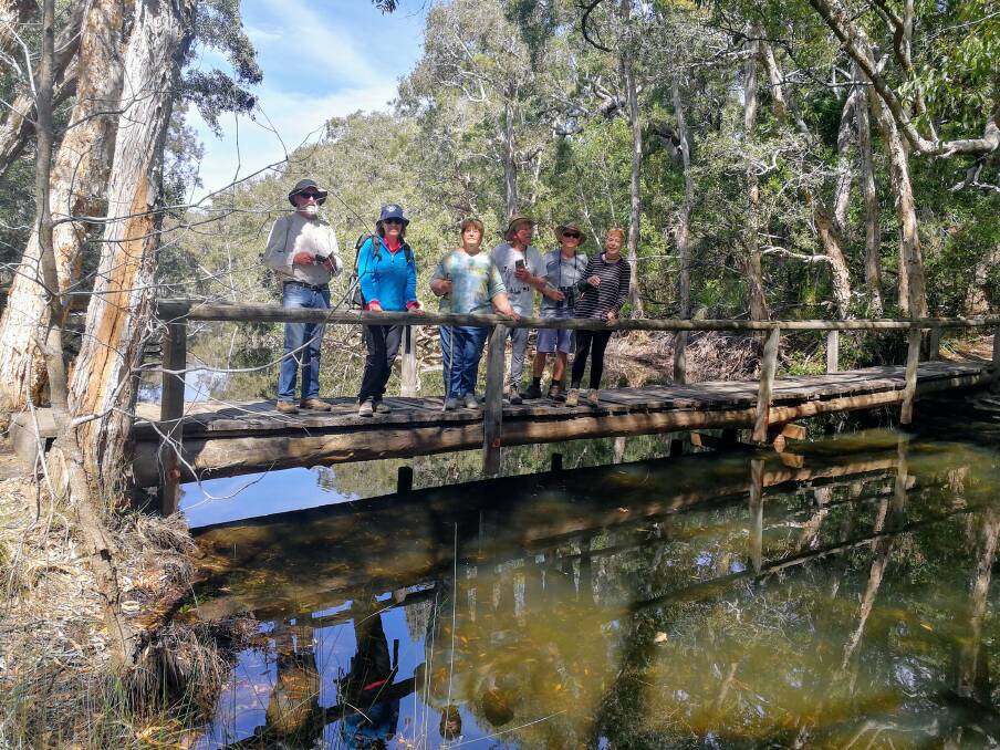 GEG members standing on a little footbridge over Saltwater Gully,in Saltwater National Park. Photo. Supplied
