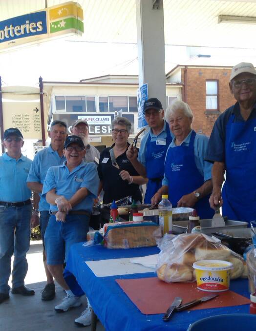 Gloucester Prostate Cancer Support Group at a recent fundraising sausage sizzle in Gloucester; just one of the events held during September. Photo supplied.