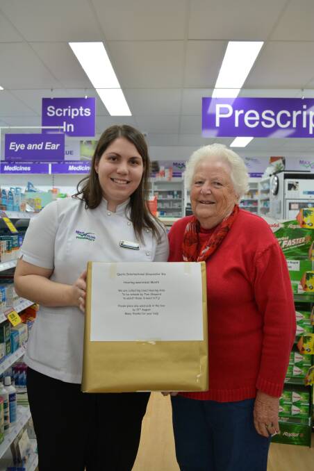 Collecting used hearing aids: Gloucester Pharmacy employee, Rosemarie Mundy and long time Quota member, Margaret Andrews with the collection box. Photo: Anne Keen 