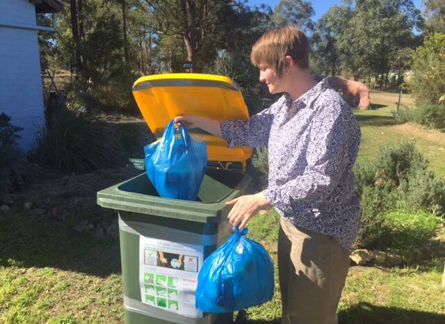 Where to drop in Gloucester: Michalie Fry places her soft plastics in the bin at the Tucker Patch. Photo: Supplied
