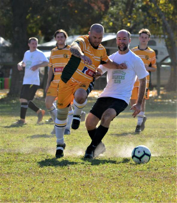 Jim Bird's fancy footwork during the Gloucester men's game against he Cundletown Jets. Photo supplied.