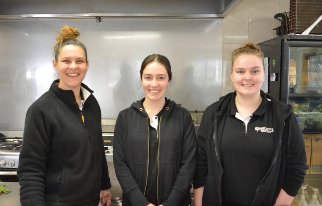 Repurposing the food through the BWNG's training kitchen will help further develop the trainees skills. Megan Coote, Raquel Burton and Taryn Crook.