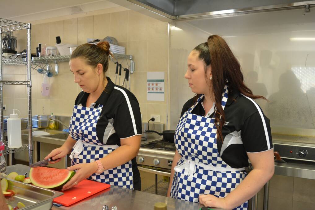Brooke Paton and Summah Laverick are preparing food for the MidCoast Council Business Seminar, the kitchen's first catering job. Photo Anne Keen