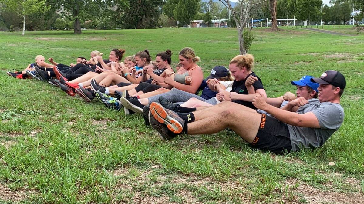 All together now: Gloucester Cockies are put through their paces in a pre-season training session. Photo: supplied.