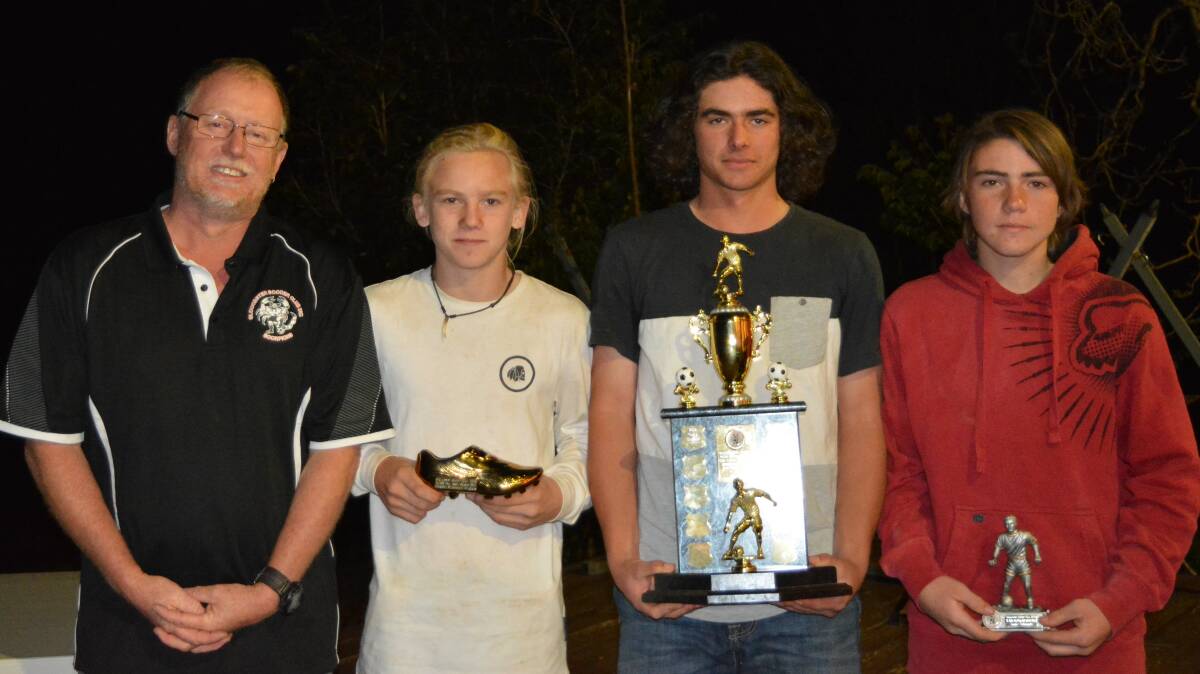 Coach Geoff Hawkins with trophy winners Kayden Schumann, Cody Howard and Lane Edwards. Photo supplied