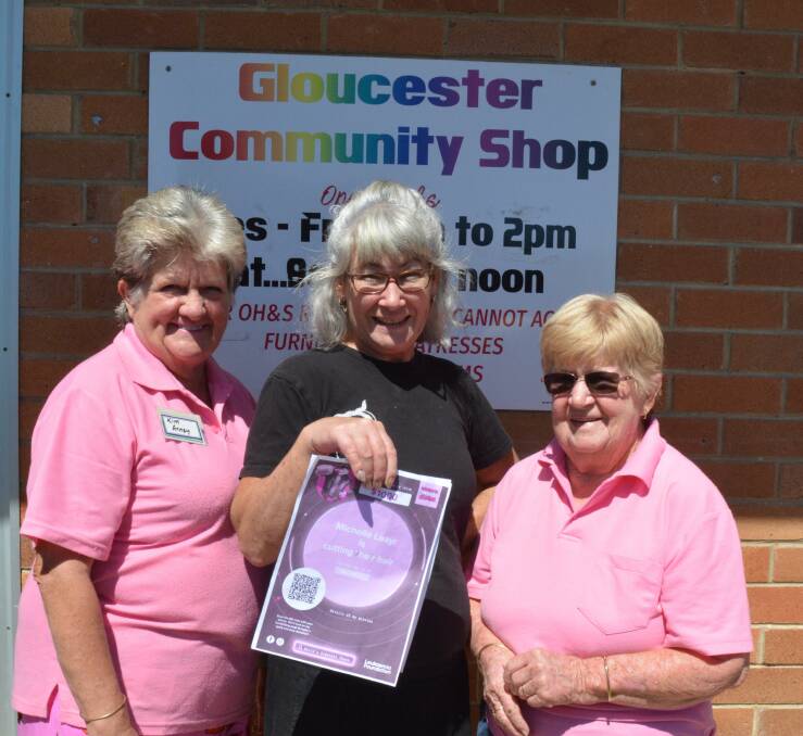 A very excited Michelle Leayr (middle) with shop volunteers Kim Arney and Fay Fenning.