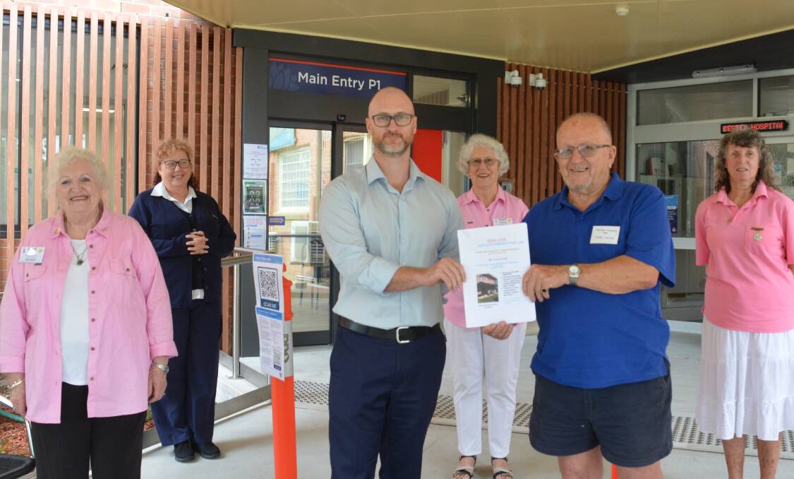 Carol Bennett, Debbie Buckton, Wade Smith, Judith Pittman, Cedric Salter and Di Relf at the newly renovated entrance to Gloucester hospital. Photo Anne Keen 