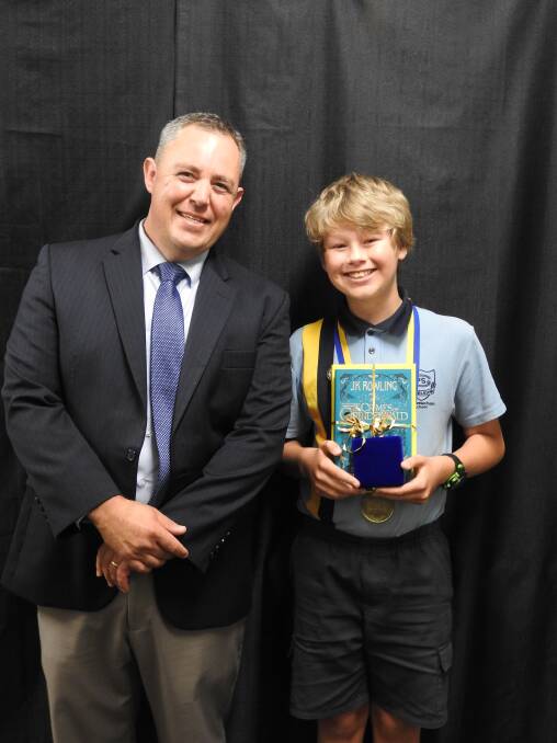 Dux of the school for 2018: Quinlan Collins with assistant principal Rod Maggs