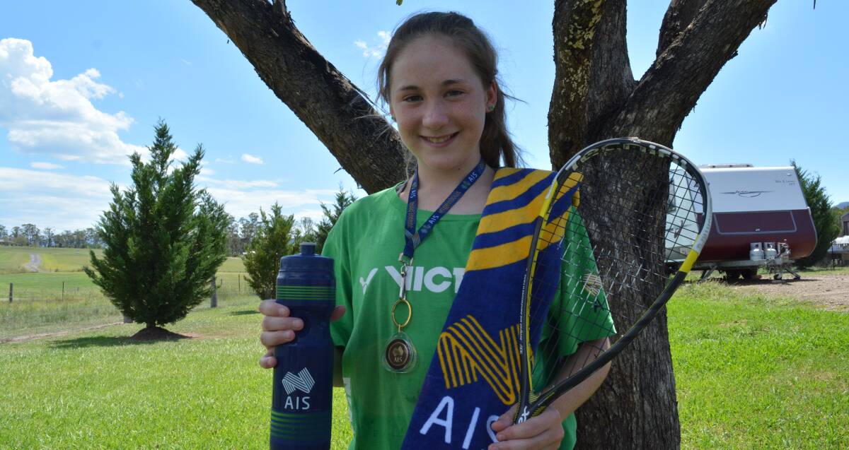 Getting all the gear: Tanai O’Brien wanted to buy everything in the store to make sure she had plenty of souvenirs from the Australian Institute of Sport.