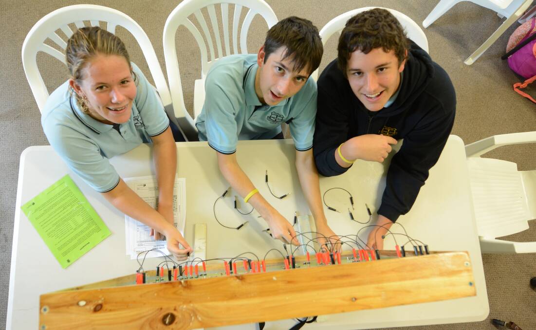 Cara McIntosh, Patrick Scarborough and Connor McIntosh from Gloucester High School at Science & Engineering Challenge at Taree 2017. Picture: Scott Calvin